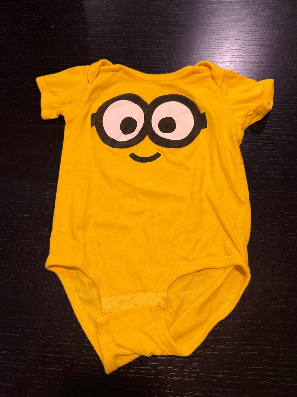 Universal Yellow Baby One-Piece with Playful Eye Graphic